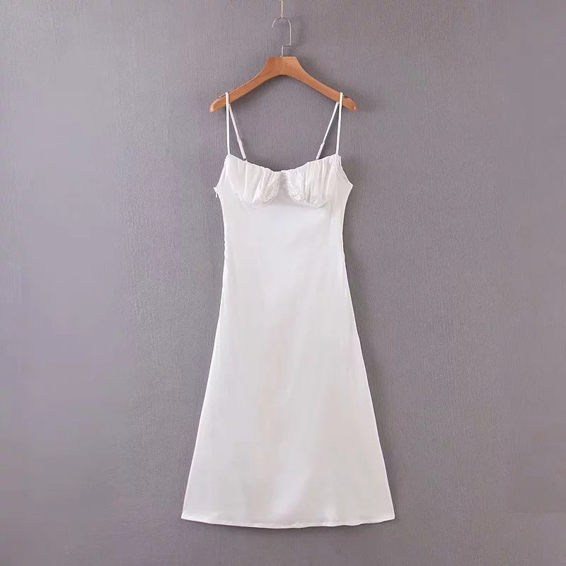 Simple pleated white dress with condole belt