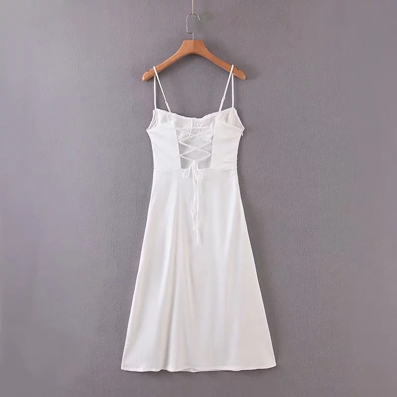 Simple pleated white dress with condole belt